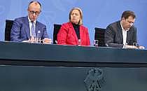 Friedrich Merz, Bärbel Bas, Lars Klingbeil am 11.12.2025, über dts Nachrichtenagentur